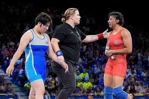 Nisha Dahiya after the women's freestyle 68kg wrestling quarterfinal